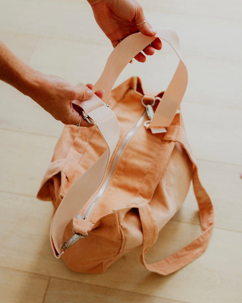 pocket tote with adjustable strap