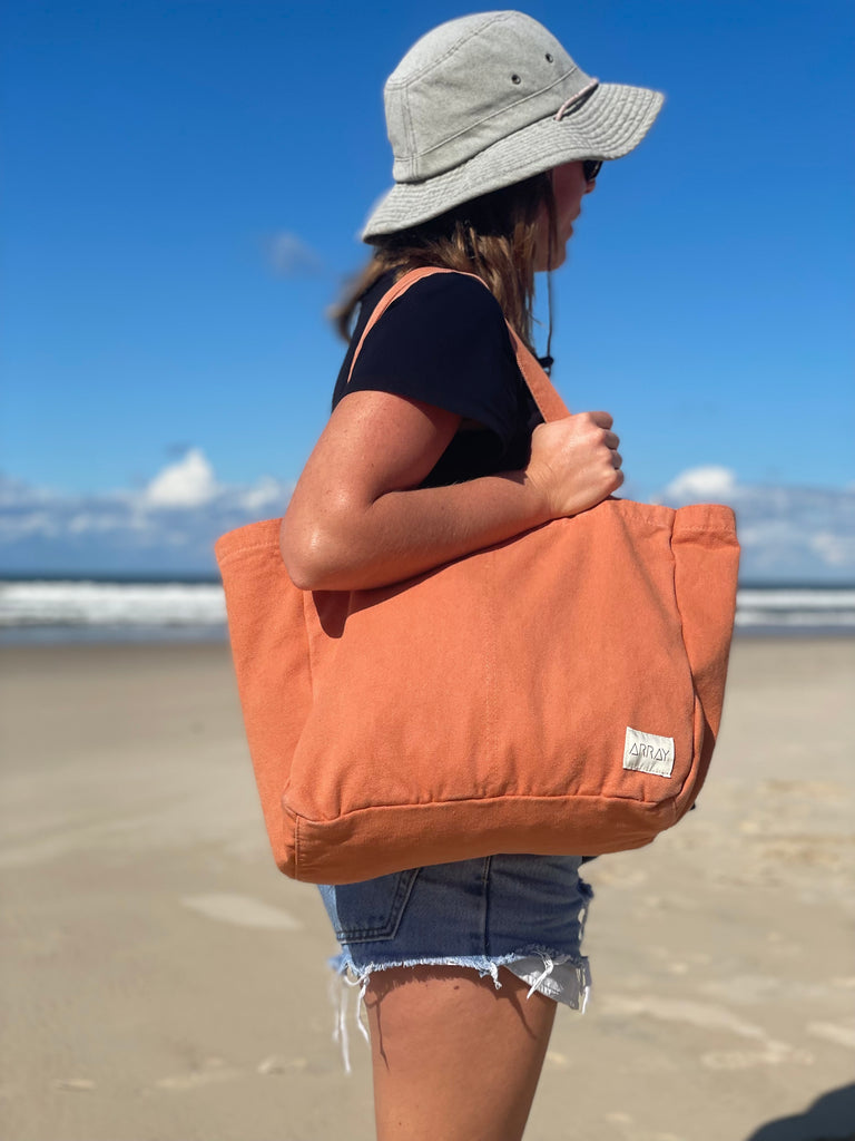 Everyday bag with pockets in a unisex casual style, the pockets will help organise everything, perfect work bag, baby bag, or beach bag.