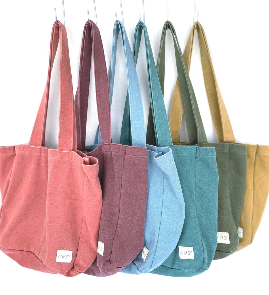 Everyday bag with pockets in a unisex casual style, the pockets will help organise everything, perfect work bag, baby bag, or beach bag.
