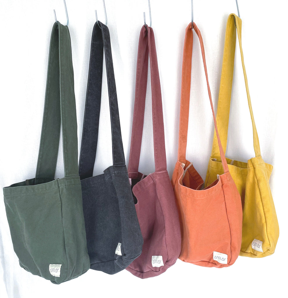 Everyday bag with pockets in a unisex casual style, the pockets will help organise everything, perfect work bag, baby bag, or beach bag.