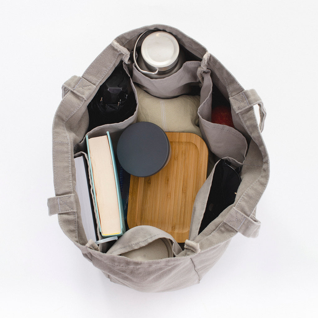 Everyday bag with pockets in a unisex casual style, the pockets will help organise everything, perfect work bag, baby bag, or beach bag.