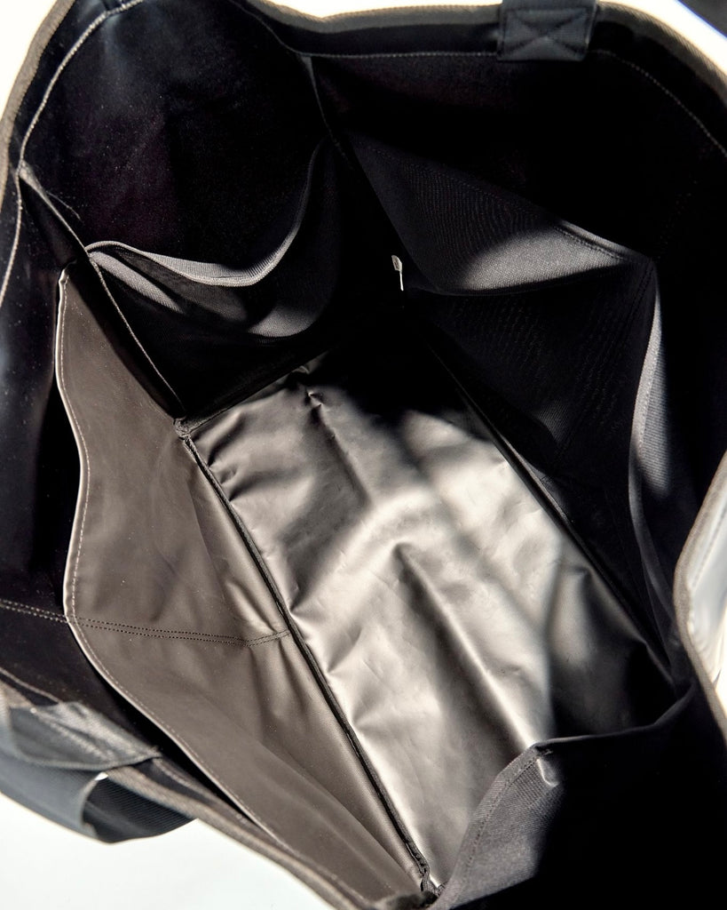 Huge water resistant bag for pool or beach, with pockets.