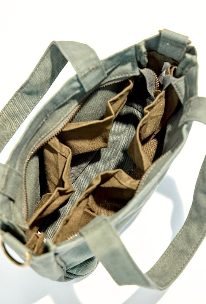 Small version of the bestselling totes, with six pockets.