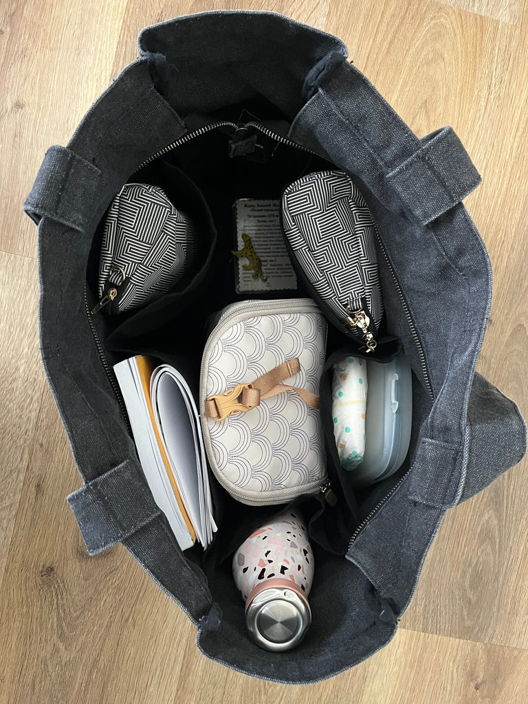 Everyday Zip Top tote bag with six internal pockets, in a versatile and casual style. Organise the chaos of everyday life. From baby bag, to work bag it is an everyday essential.