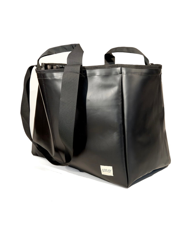 Huge water resistant bag for pool or beach, with pockets.