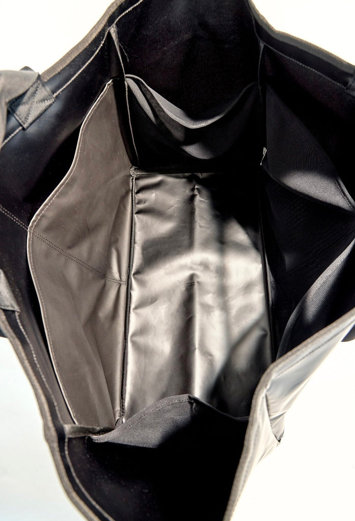 Huge water resistant bag for pool or beach, with pockets.