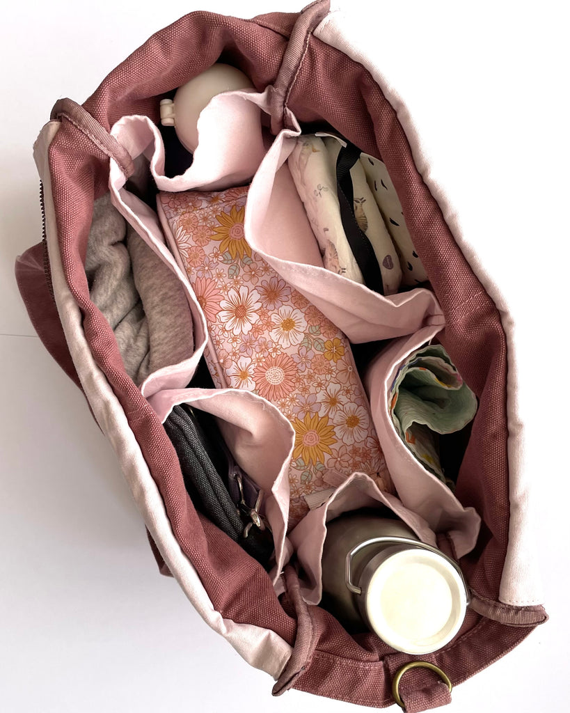 Everyday Zip Top tote bag with six internal pockets, in a versatile and casual style. Organise the chaos of everyday life. From baby bag, to work bag it is an everyday essential.