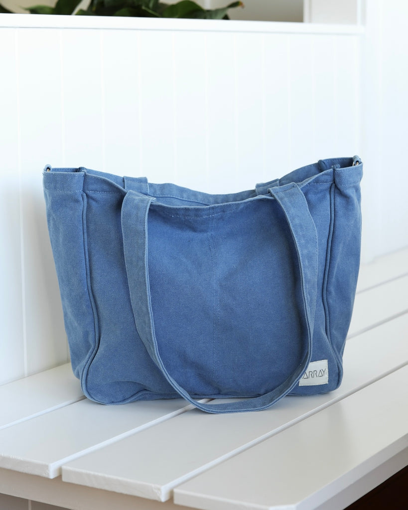 The Everyday Pocket Tote is a medium sized tote bag with six internal pockets for organising all the things, in a casual and understated style for those who like to keep it simple.