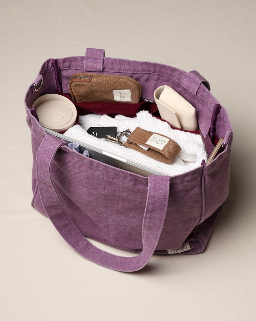 The Everyday Pocket Tote is a medium sized tote bag with six internal pockets for organising all the things, in a casual and understated style for those who like to keep it simple.