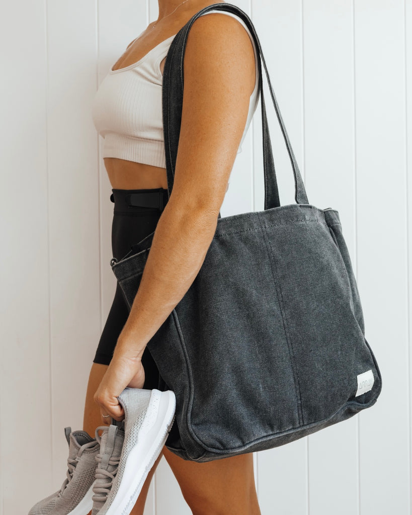 Everyday Zip Top tote bag with six internal pockets, in a versatile and casual style. Organise the chaos of everyday life. From baby bag, to work bag it is an everyday essential.