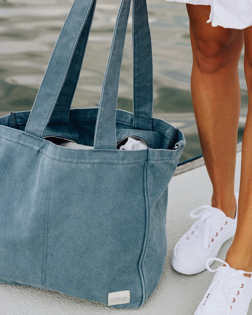 Everyday Zip Top tote bag with six internal pockets, in a versatile and casual style. Organise the chaos of everyday life. From baby bag, to work bag it is an everyday essential.