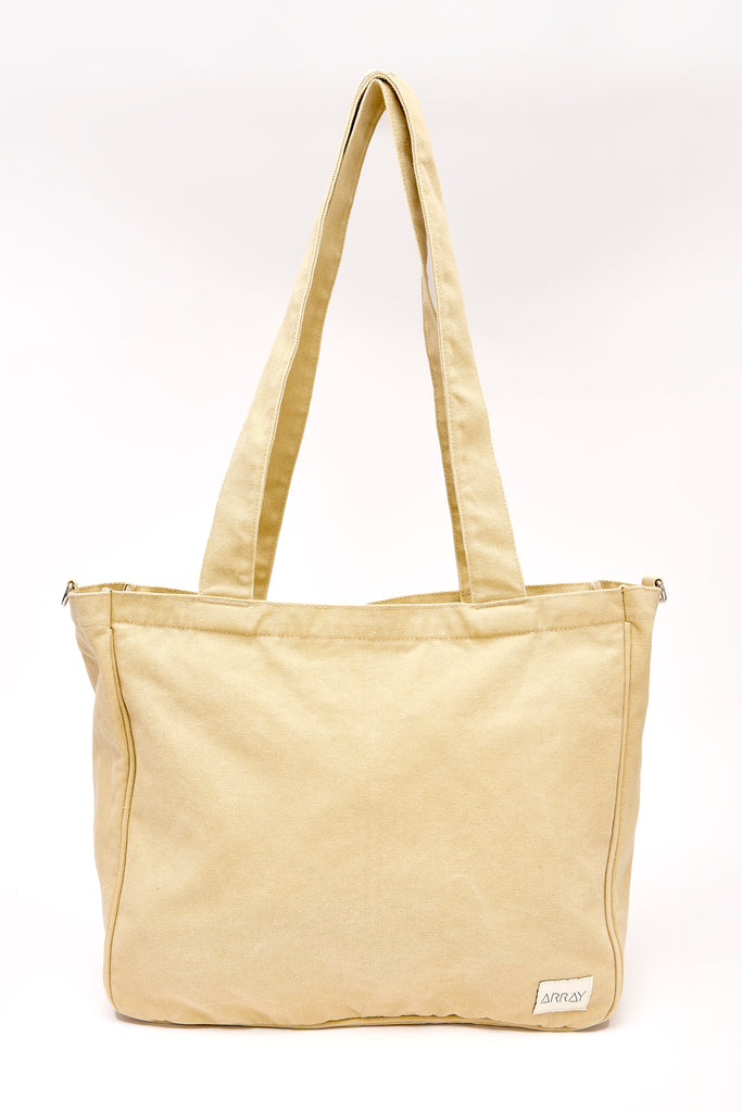 Larger version of the bestselling everyday zip top pocket tote, with six internal pockets, in a versatile and casual style. Large enough to fit a laptop, lunchbag or large water bottle, it makes the perfect bag for work or study, or the ultimate mumbag.
