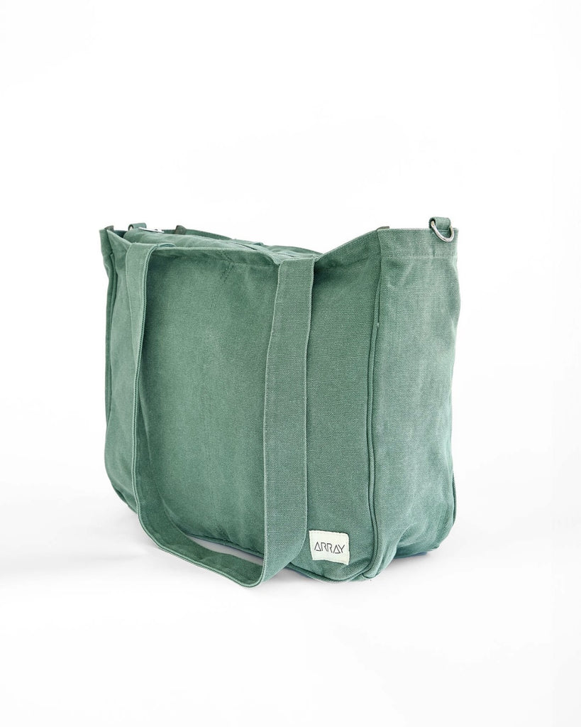 Larger version of the bestselling everyday zip top pocket tote, with six internal pockets, in a versatile and casual style. Large enough to fit a laptop, lunchbag or large water bottle, it makes the perfect bag for work or study, or the ultimate mumbag.
