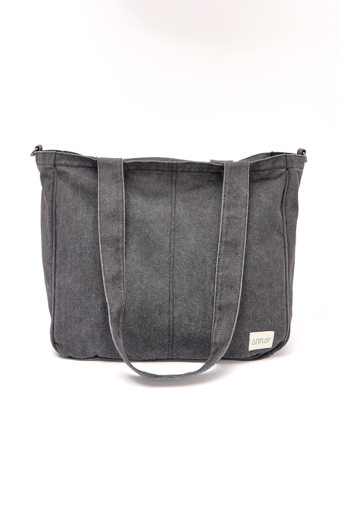 Larger version of the bestselling everyday zip top pocket tote, with six internal pockets, in a versatile and casual style. Large enough to fit a laptop, lunchbag or large water bottle, it makes the perfect bag for work or study, or the ultimate mumbag.