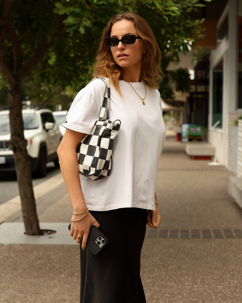 Mini Pocket tote bag with six internal pockets, in a versatile and casual style. Organise the chaos of everyday life. From baby bag, to work bag it is an everyday essential.