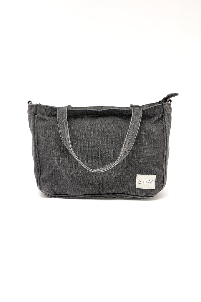 Smaller version of the bestselling everyday zip top pocket tote, with six internal pockets, in a versatile and casual style. The perfect bag for days when you don’t need to carry everything.