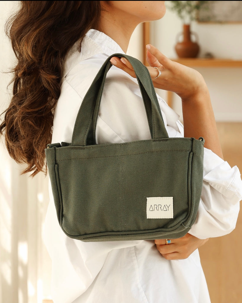 the compact, yet mighty, pint-sized version of our bestselling Everyday Pocket Tote