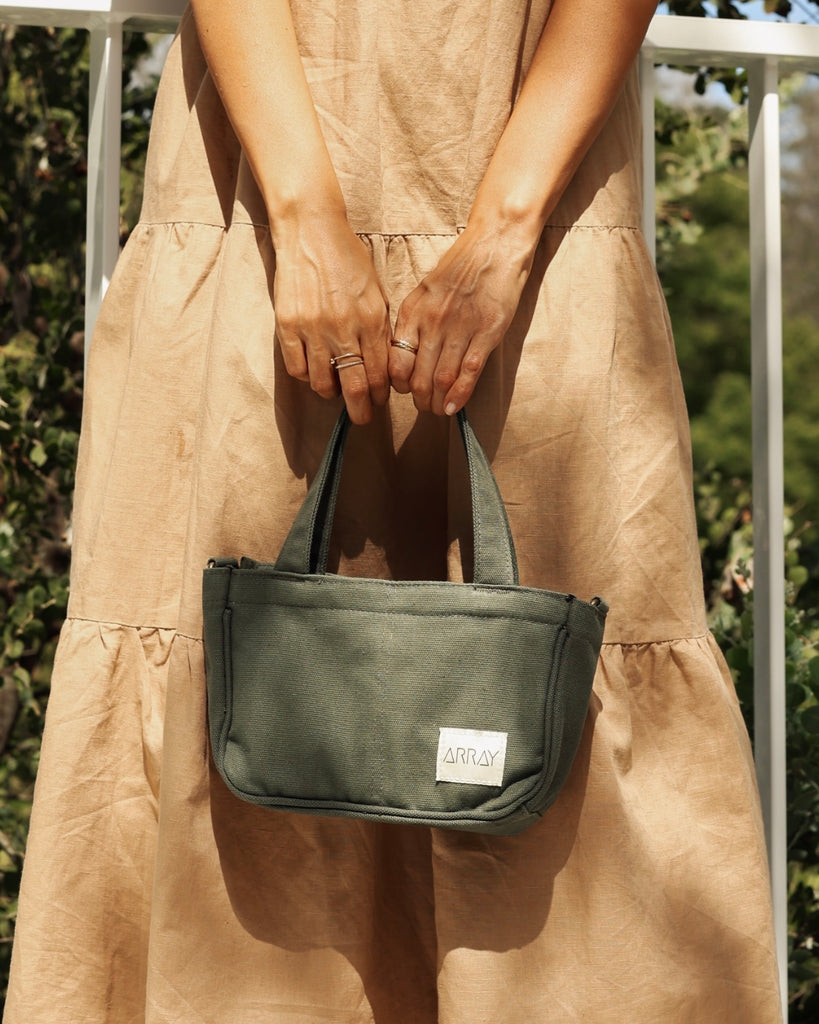 the compact, yet mighty, pint-sized version of our bestselling Everyday Pocket Tote