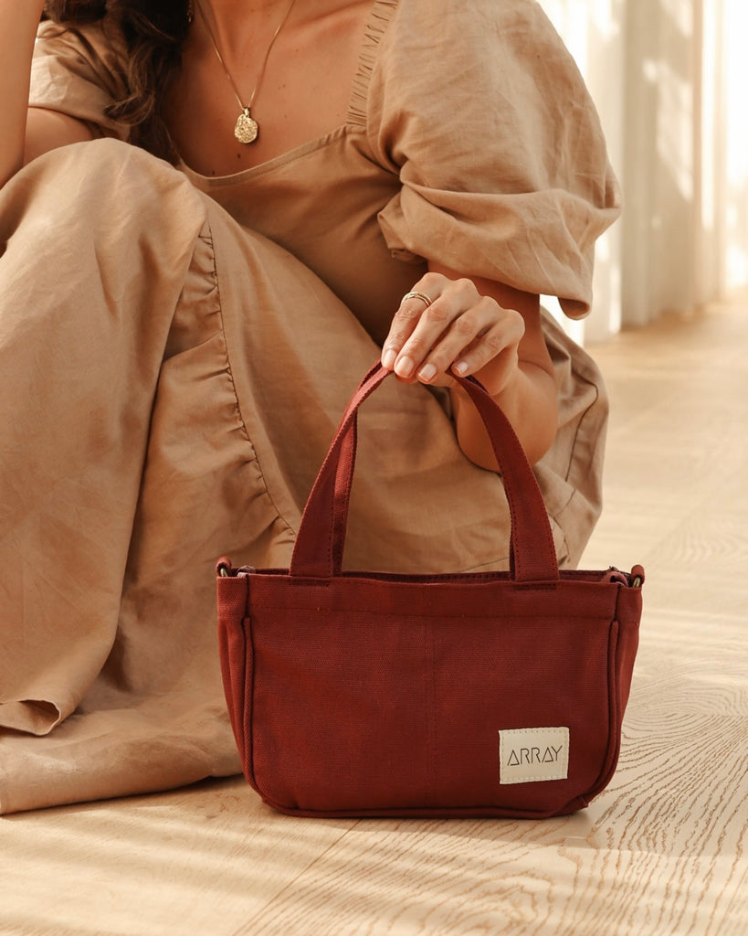 the compact, yet mighty, pint-sized version of our bestselling Everyday Pocket Tote