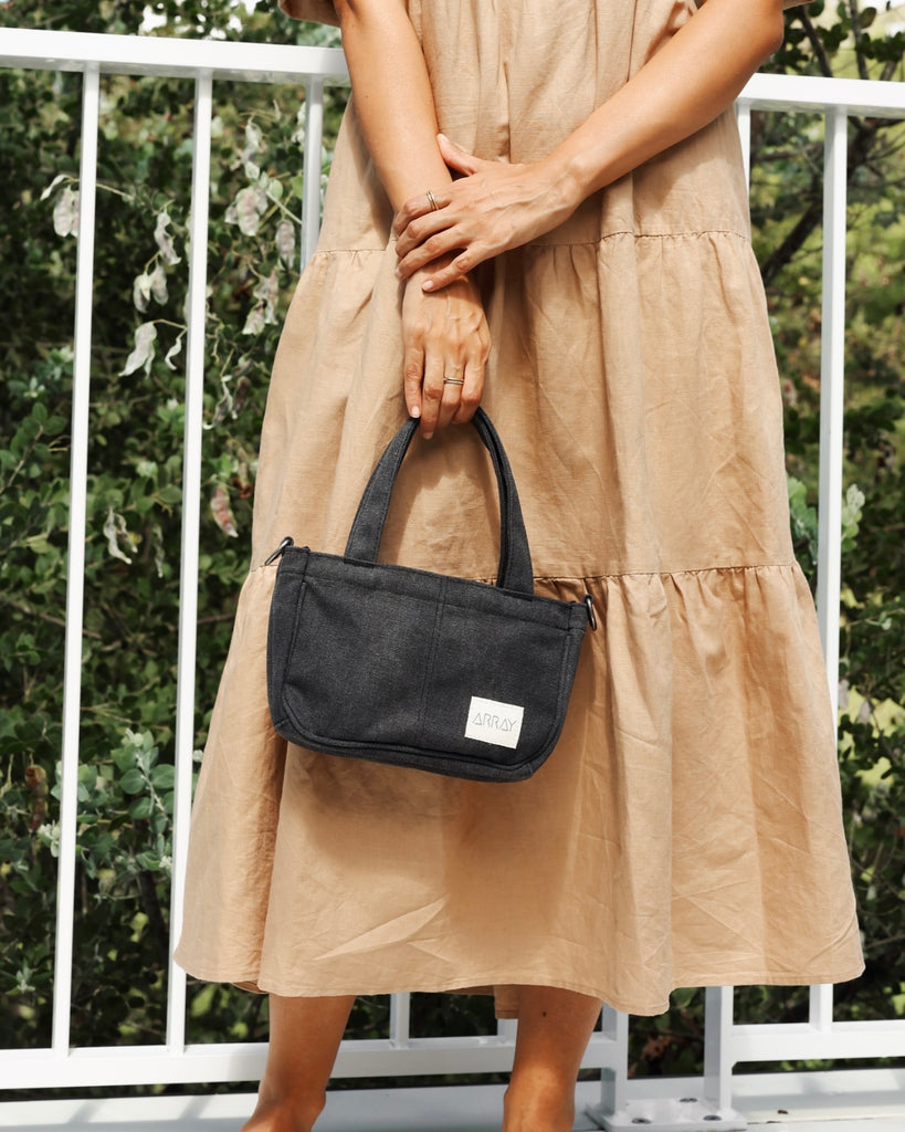 the compact, yet mighty, pint-sized version of our bestselling Everyday Pocket Tote