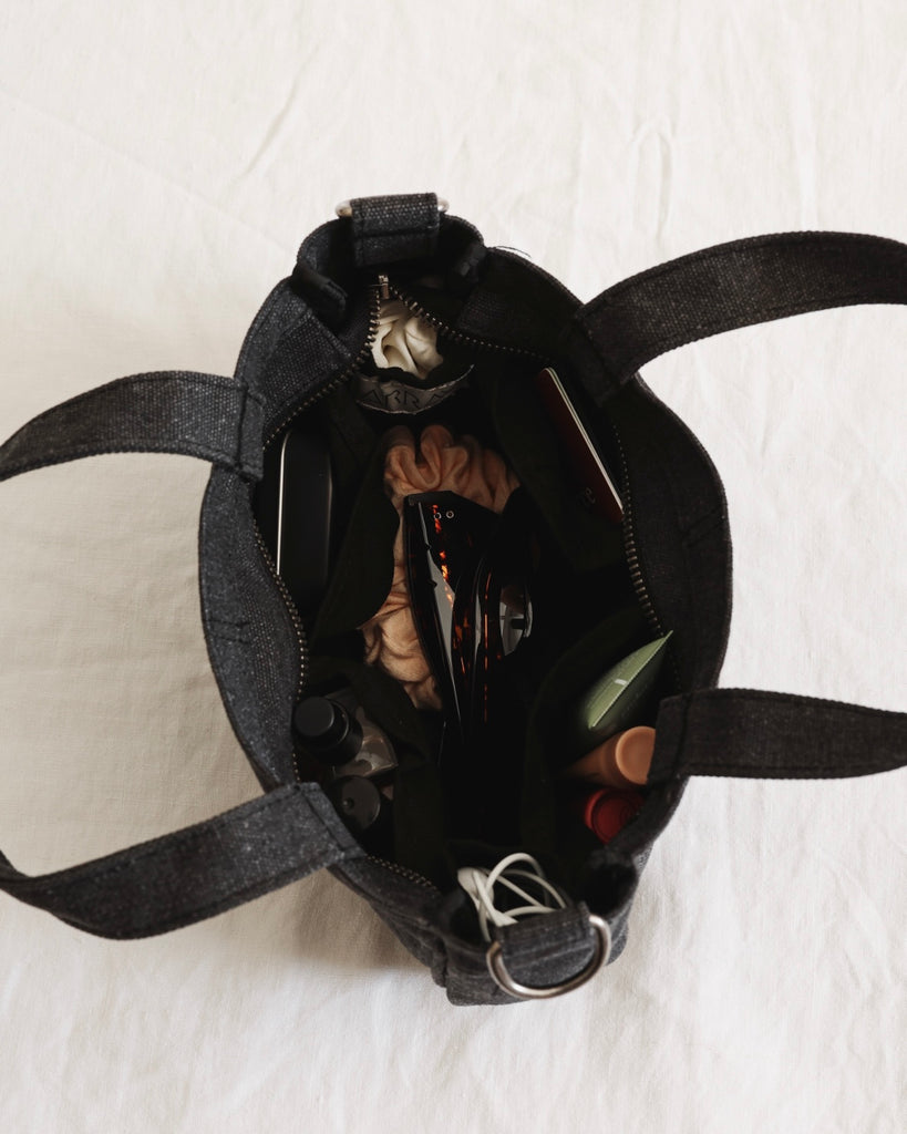 Small version of the bestselling totes, with six pockets.