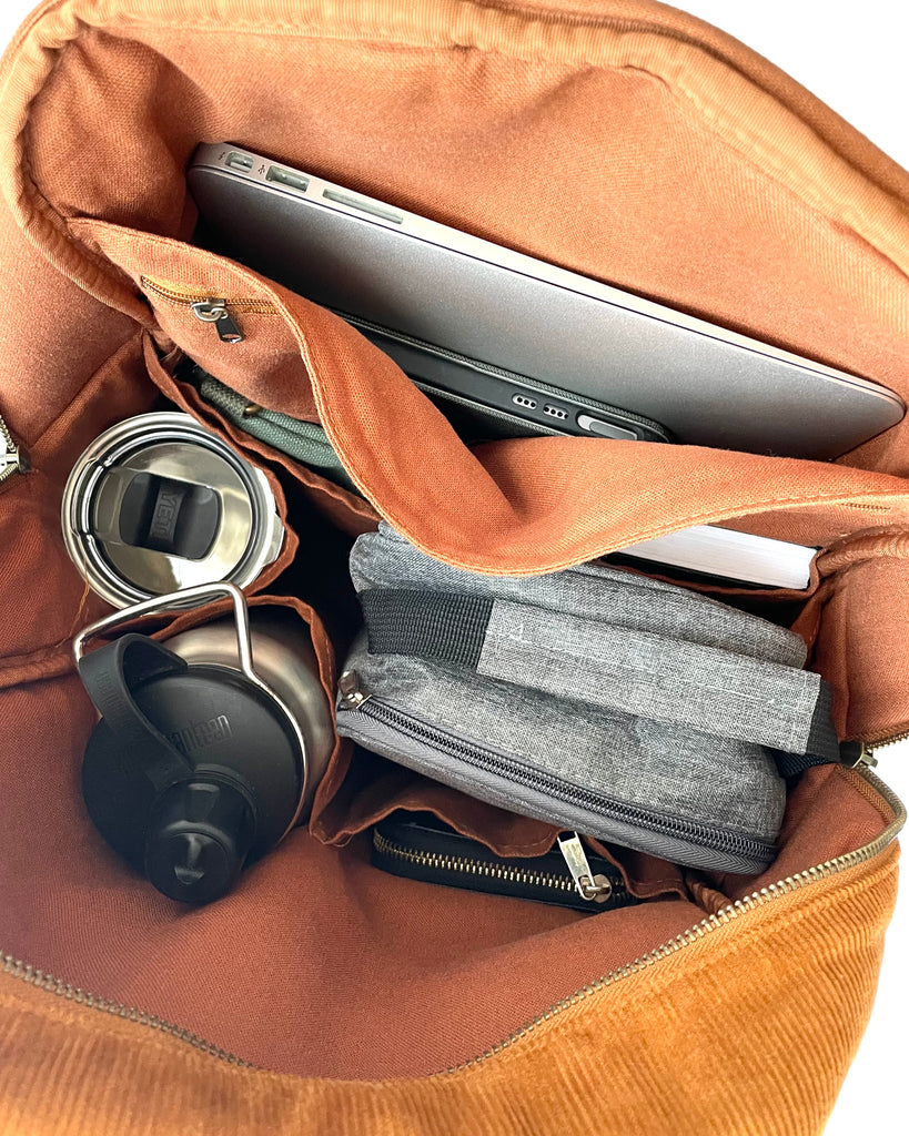 A backpack with plenty of pockets to help organise everything you need in a day. From baby bag to work bag, this versatile and casual style backpack will become your everyday essential.