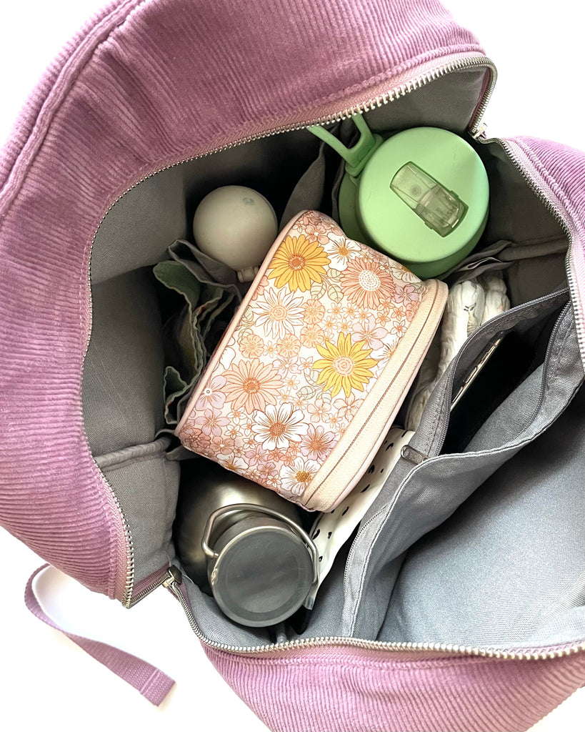 A backpack with plenty of pockets to help organise everything you need in a day. From baby bag to work bag, this versatile and casual style backpack will become your everyday essential.