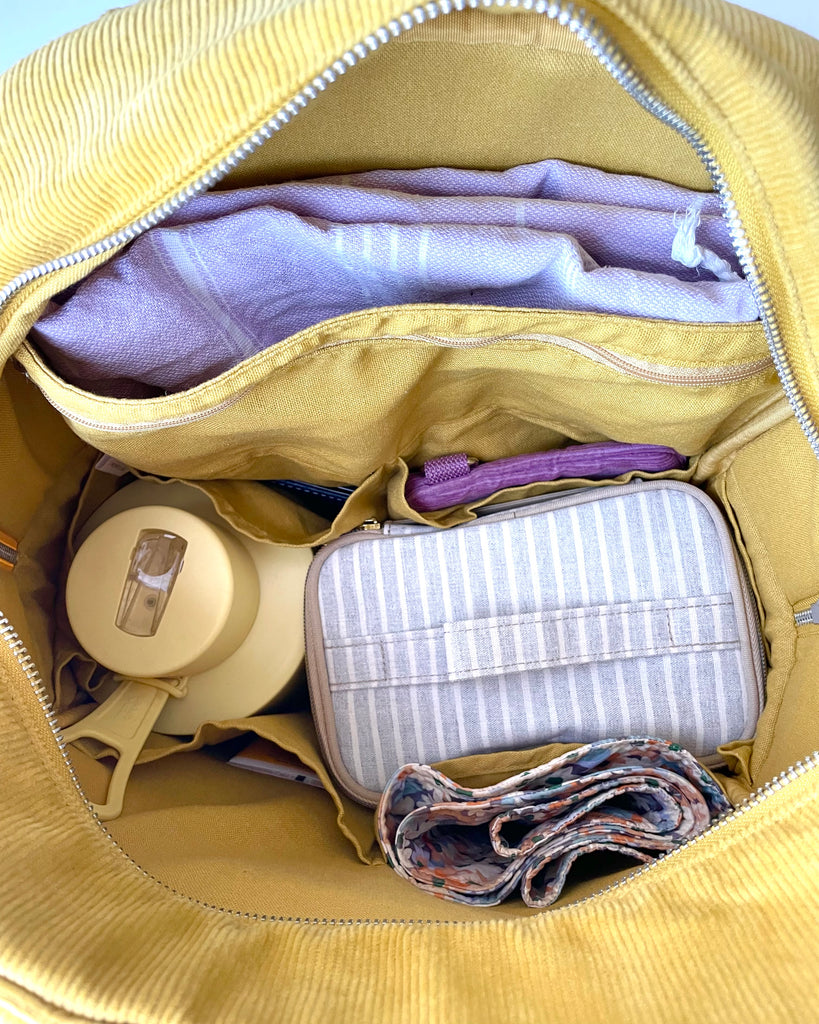 A backpack with plenty of pockets to help organise everything you need in a day. From baby bag to work bag, this versatile and casual style backpack will become your everyday essential.