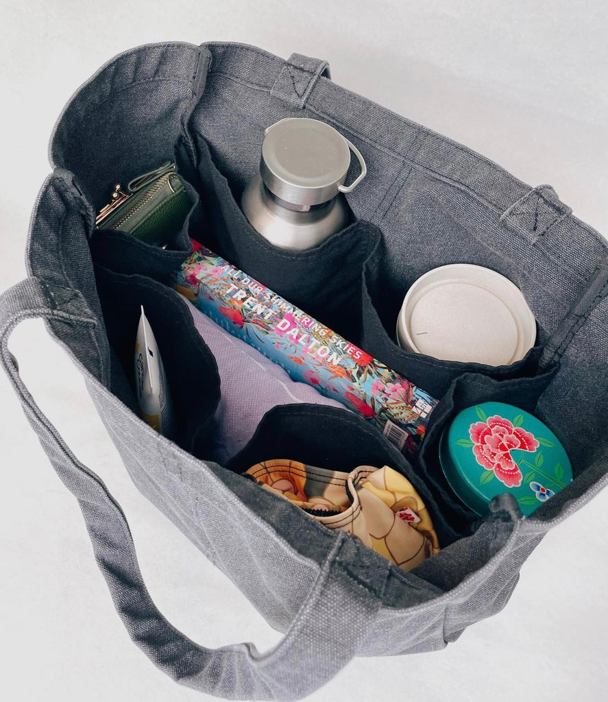 Everyday Zip Top tote bag with six internal pockets, in a versatile and casual style. Organise the chaos of everyday life. From baby bag, to work bag it is an everyday essential.