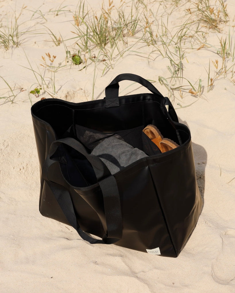 Huge water resistant bag for pool or beach, with pockets.